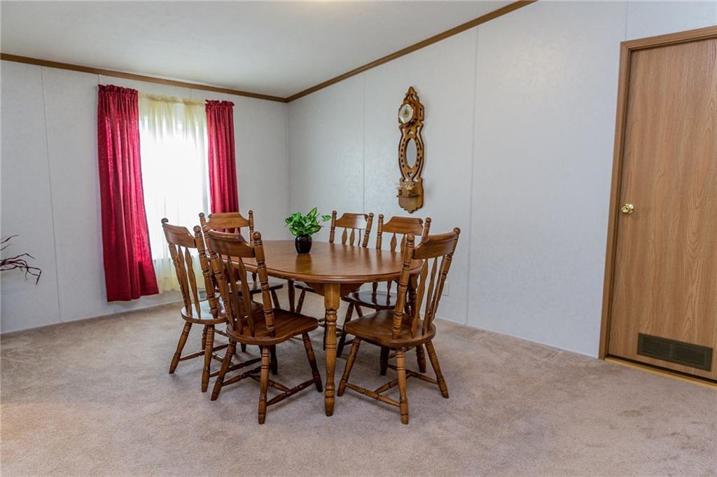 131 West Brewster Road Butler, PA 16001 - Photo 9 of 25 Dining room right off of kitchen area for evening and holiday dinners