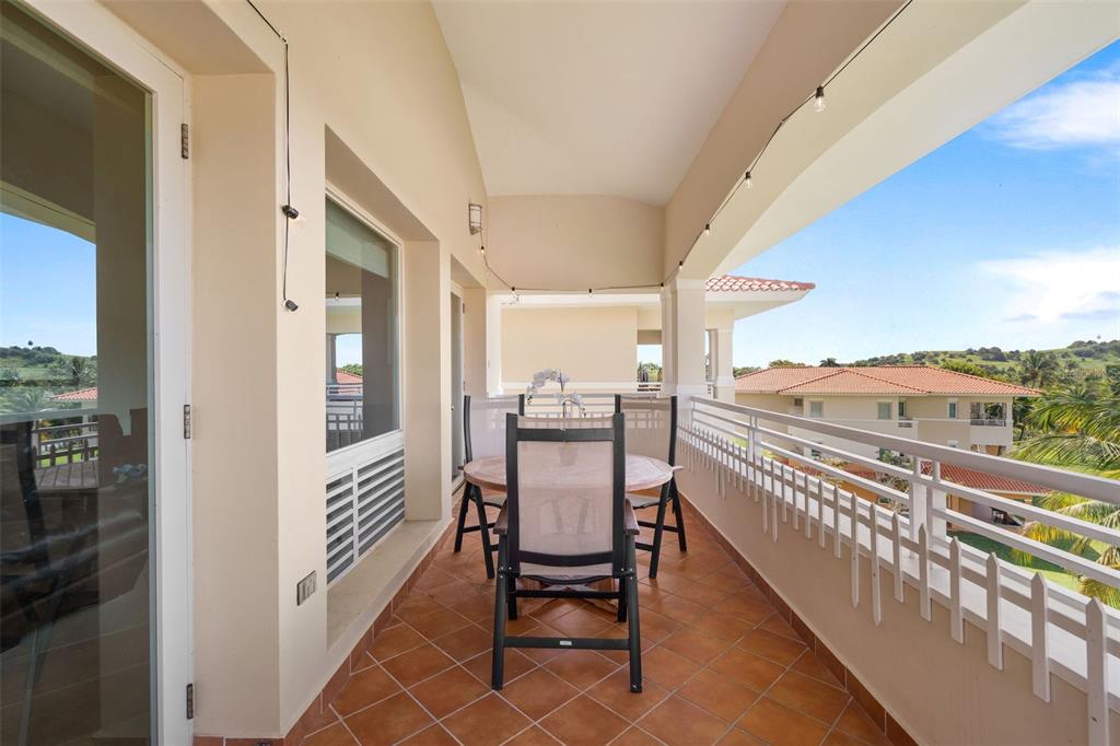 * Academy Drive Drive, Unit 25 Humacao, PR 00791 - Photo 13 of 37 a view of a balcony with chair and the terrace