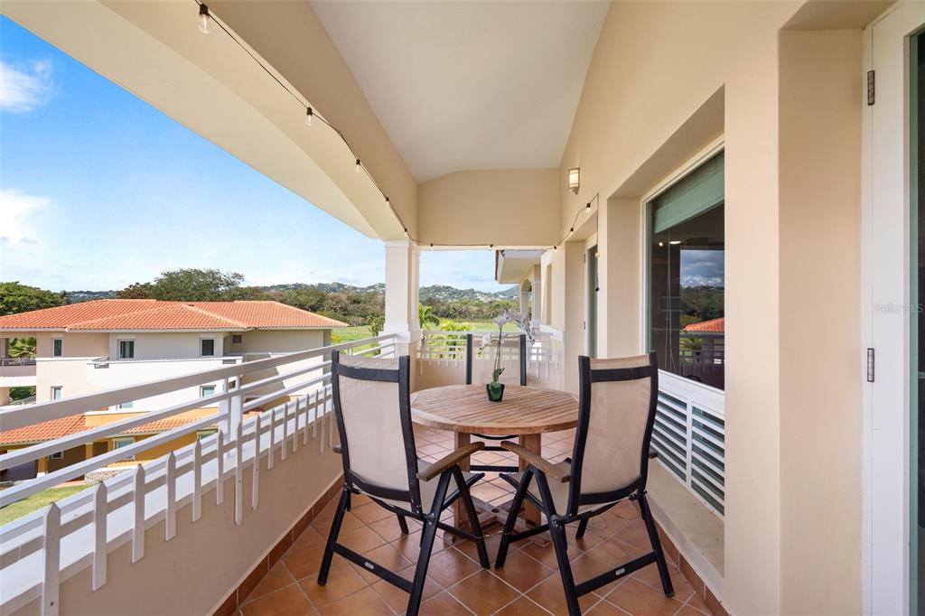 * Academy Drive Drive, Unit 25 Humacao, PR 00791 - Photo 14 of 37 a view of a chairs and table in the balcony