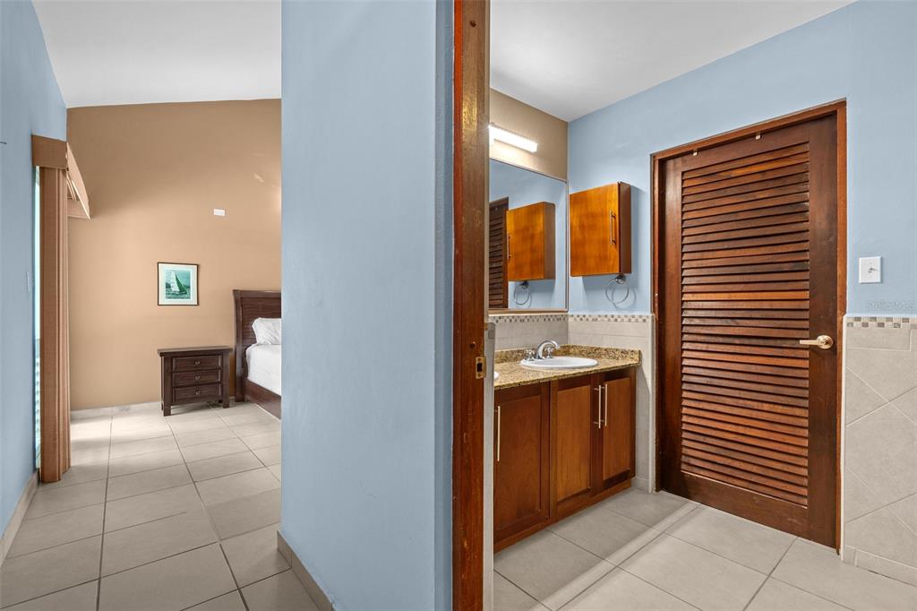 * Academy Drive Drive, Unit 25 Humacao, PR 00791 - Photo 27 of 37 a view of kitchen with a sink and a refrigerator