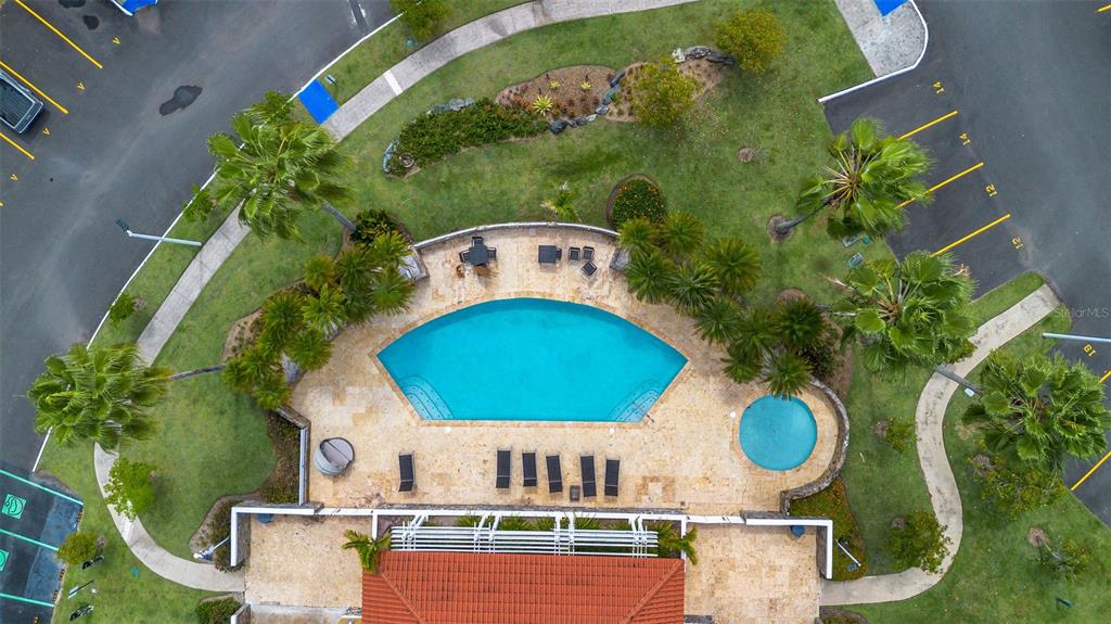 * Academy Drive Drive, Unit 25 Humacao, PR 00791 - Photo 33 of 37 an aerial view of a house with garden space and swimming pool