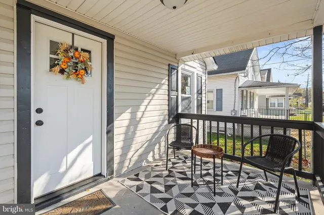 a view of a balcony with furniture