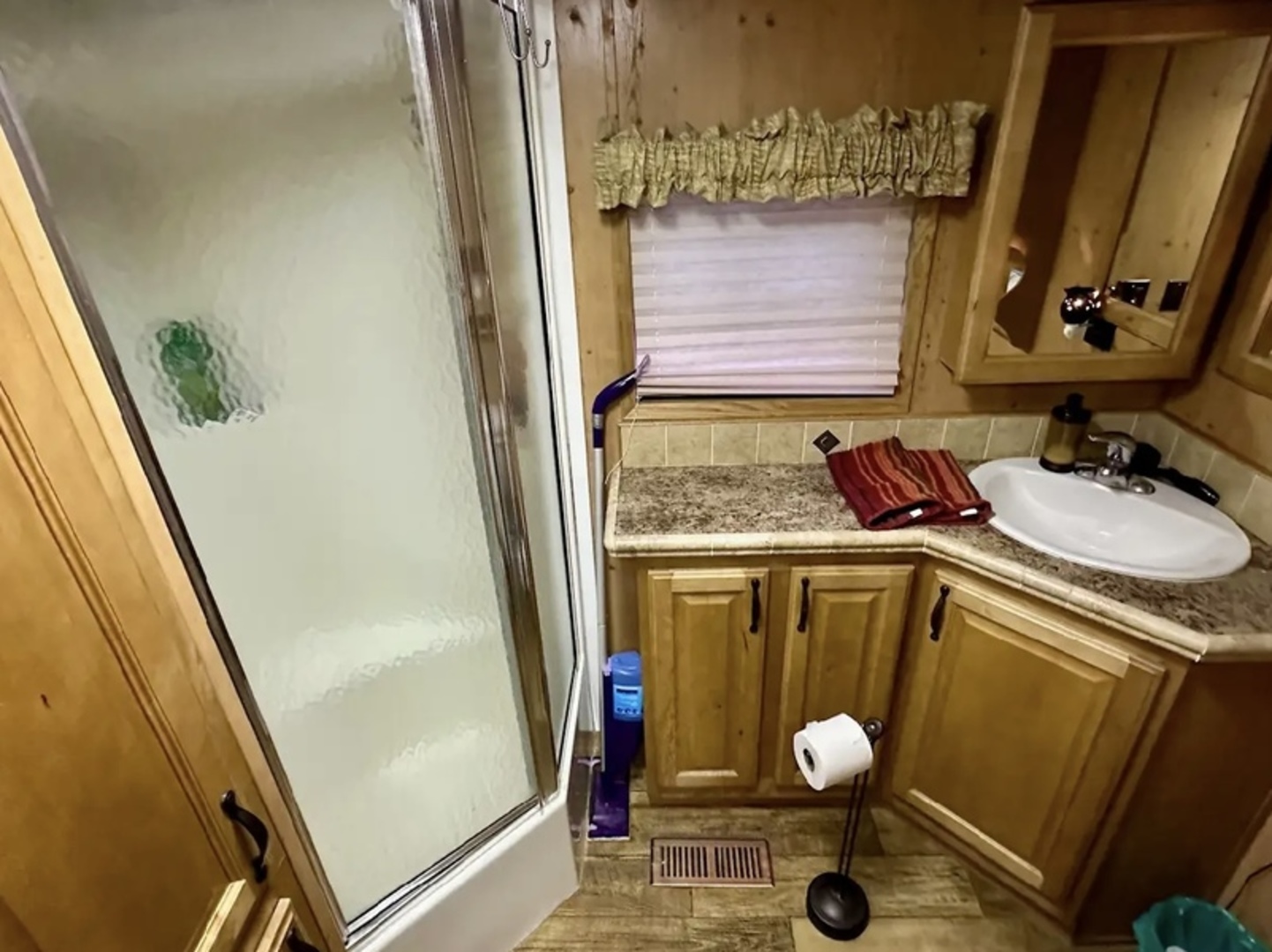 18-62-63 Woodhaven Sublette, IL 61367 - Photo 15 of 20 a bathroom with a sink and a mirror