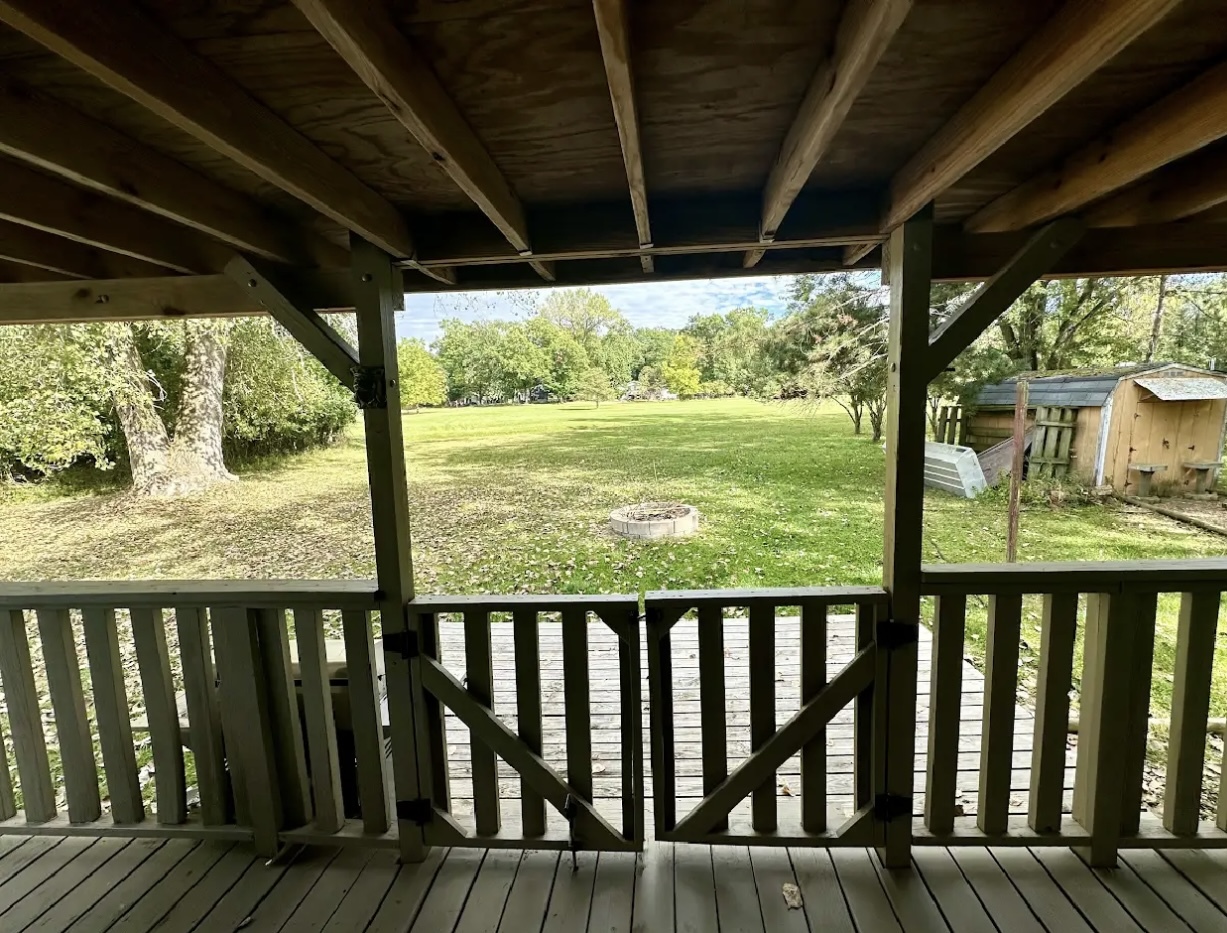 18-62-63 Woodhaven Sublette, IL 61367 - Photo 16 of 20 a view of balcony with wooden floor