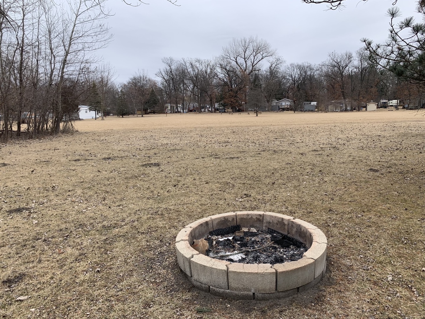 18-62-63 Woodhaven Sublette, IL 61367 - Photo 20 of 20 a outdoor view with a fountain and trees