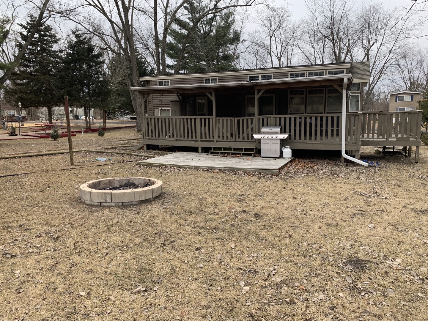 18-62-63 Woodhaven Sublette, IL 61367 - Photo 3 of 20 a view of a chair and table in the yard