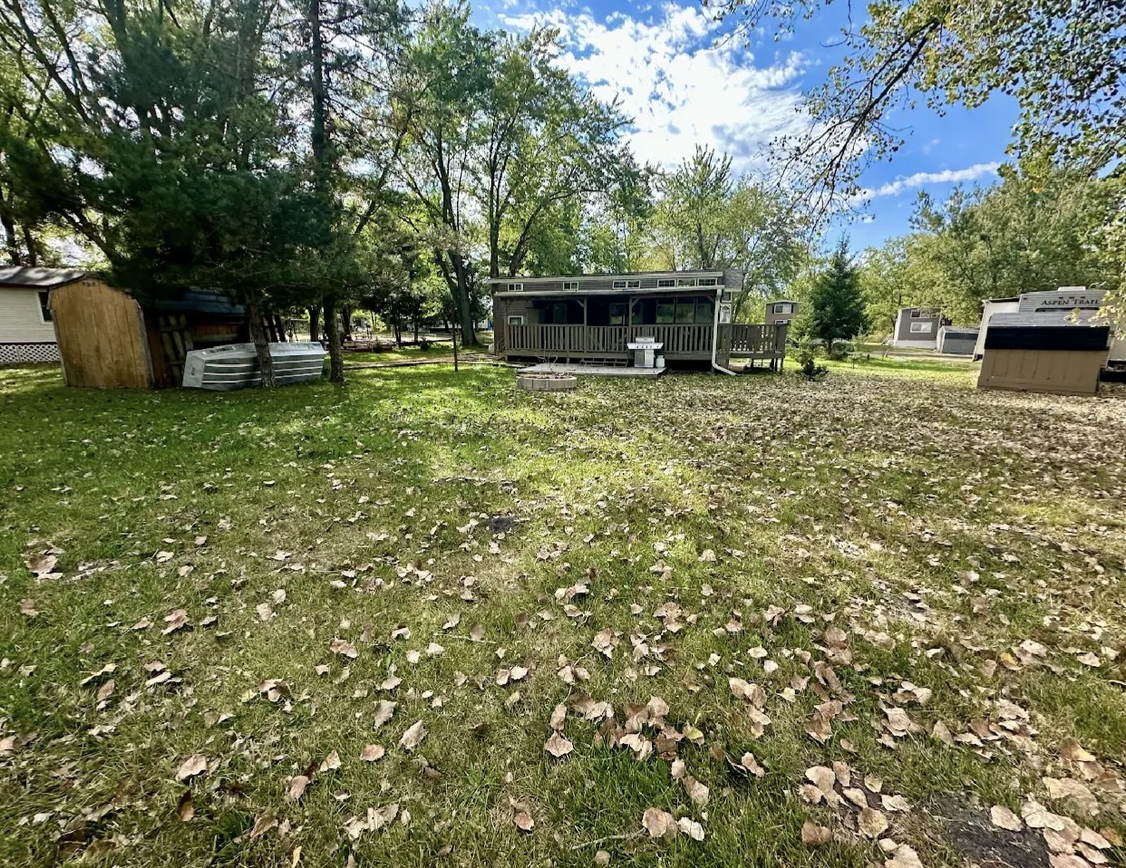 18-62-63 Woodhaven Sublette, IL 61367 - Photo 4 of 20 a front view of a house with a garden