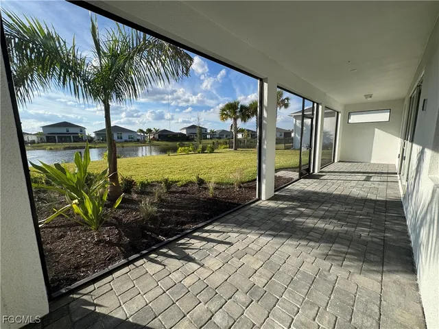 a view of a lake with a big yard