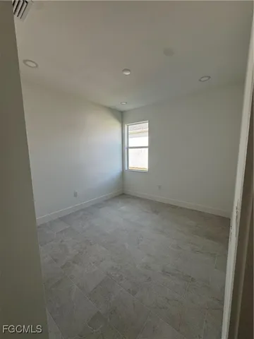 a view of empty room with window