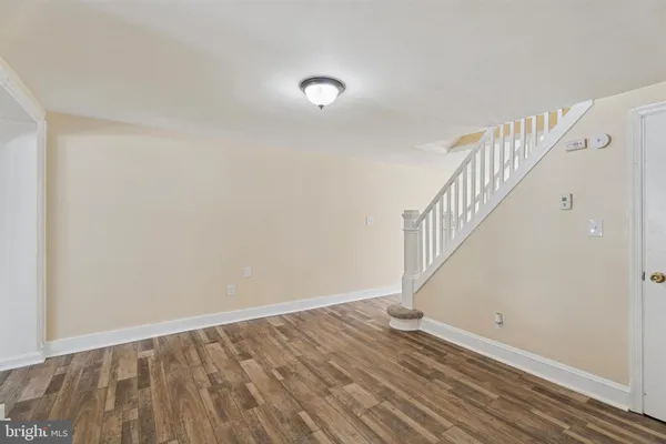 a view of entryway with wooden floor