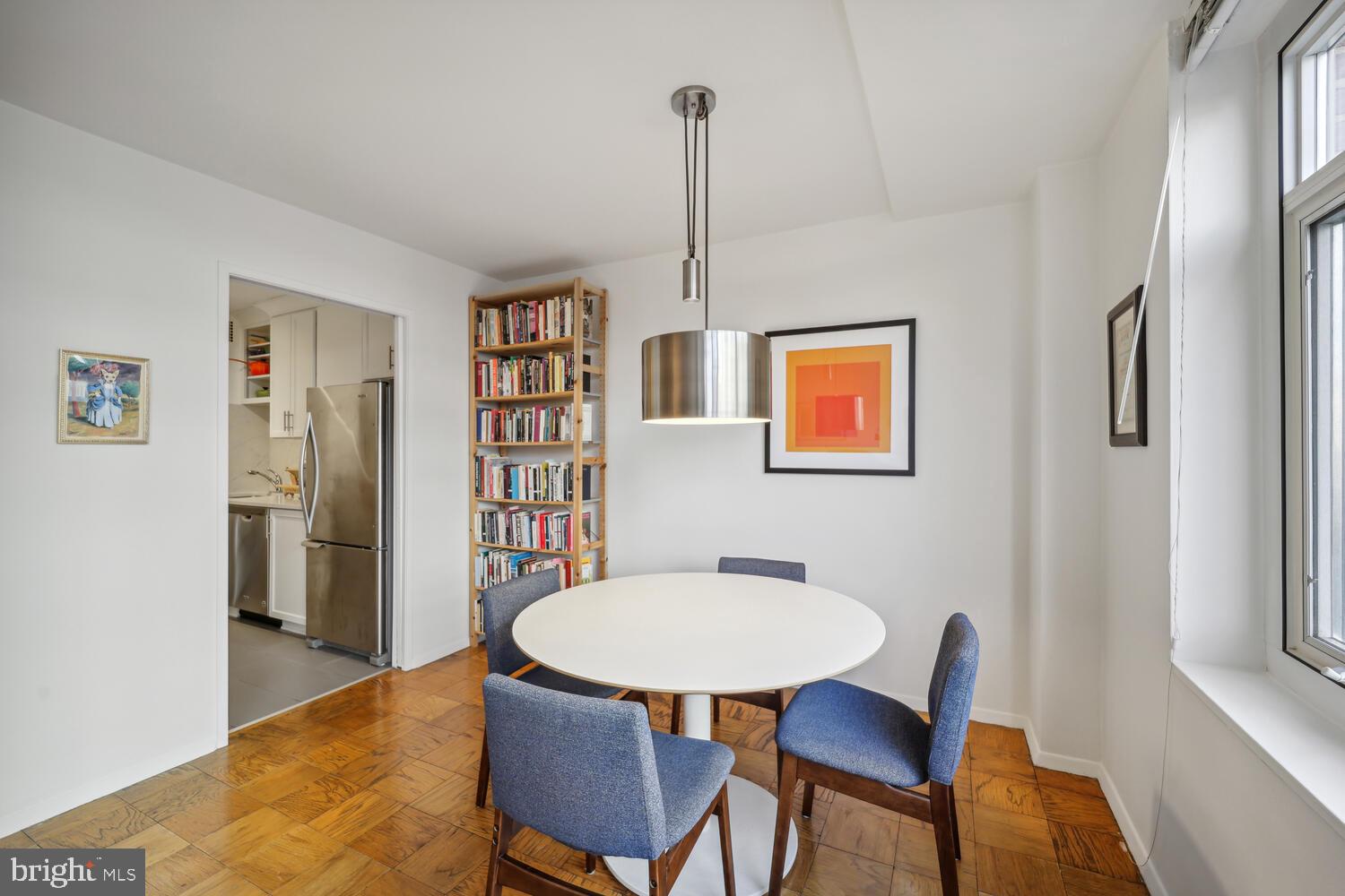 1545 18th Street Northwest, Unit 303 Washington, DC 20036 - Photo 11 of 23 Expansive open dining w/modern lighting