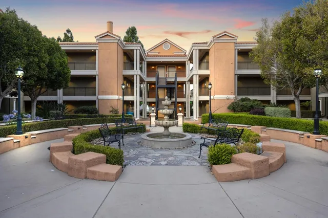 a vase of flowers sitting on a table