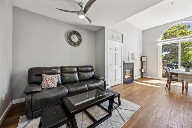 a living room with furniture and a table