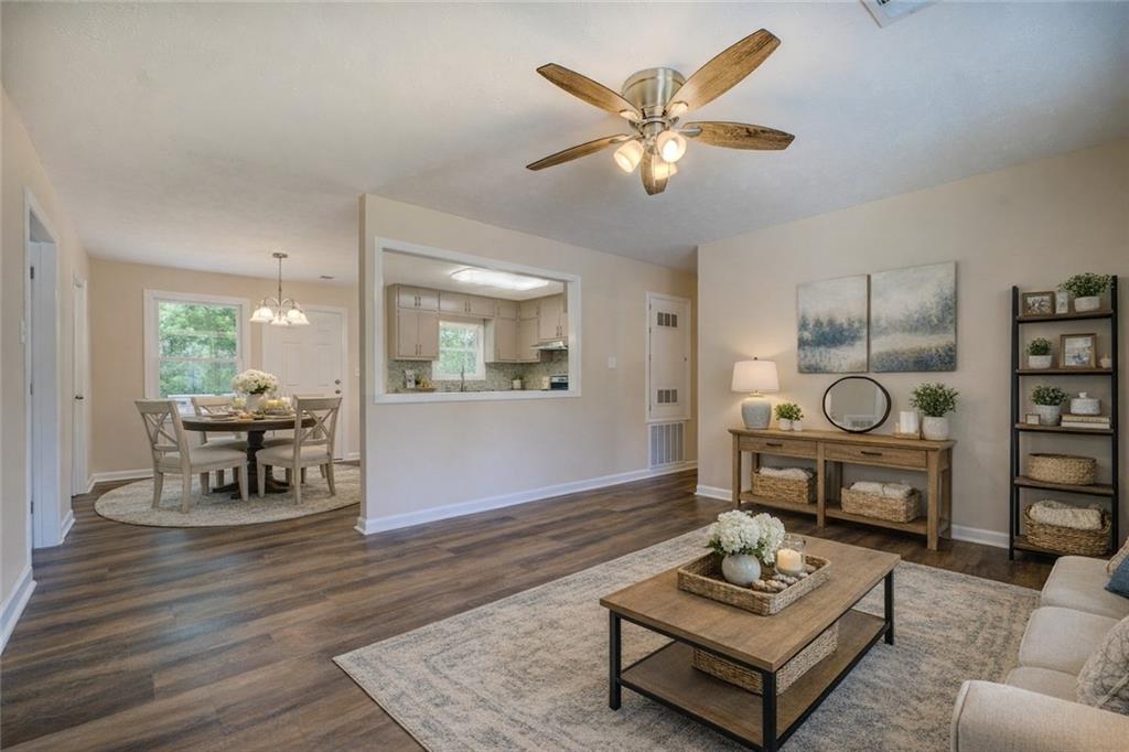 170 Hidden Pines Drive Covington, GA 30016 - Photo 4 of 22 a living room with furniture and wooden floor