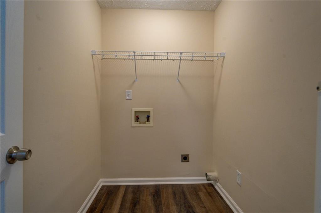 170 Hidden Pines Drive Covington, GA 30016 - Photo 10 of 22 a view of a room with rack on the wall