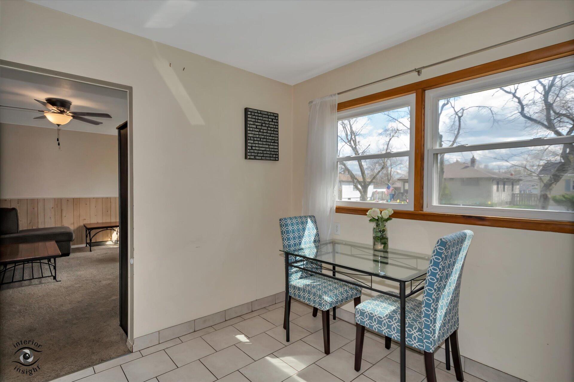 3341 Maple Drive Highland, IN 46322 - Photo 8 of 27 a dining room with furniture and window