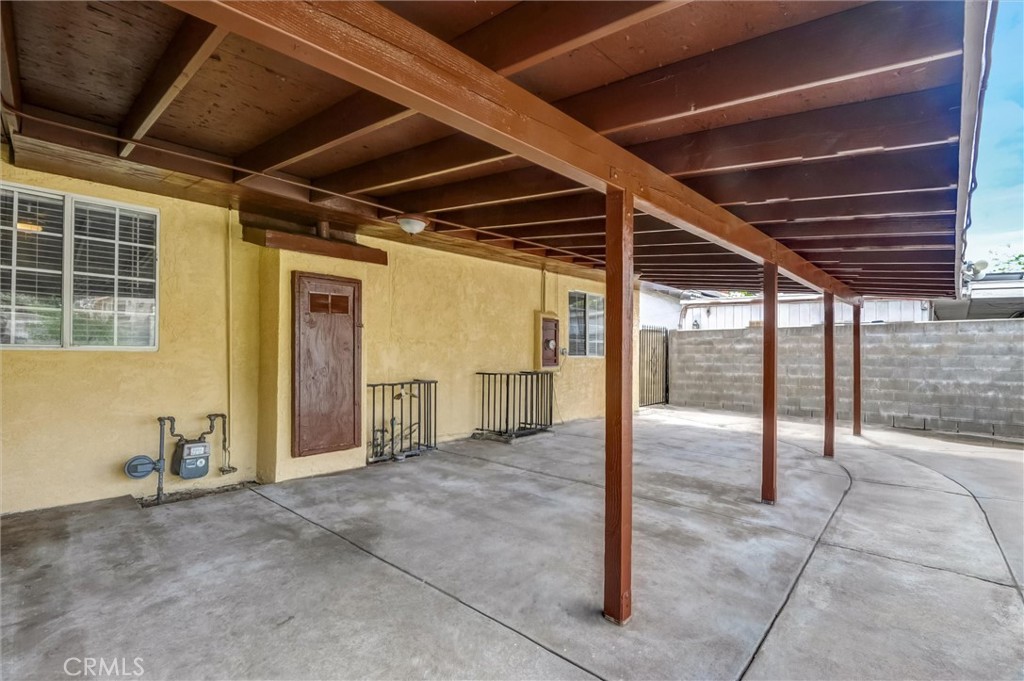 2734 Serrano Road North San Bernardino, CA 92405 - Photo 21 of 25 a view of a room with wooden floor