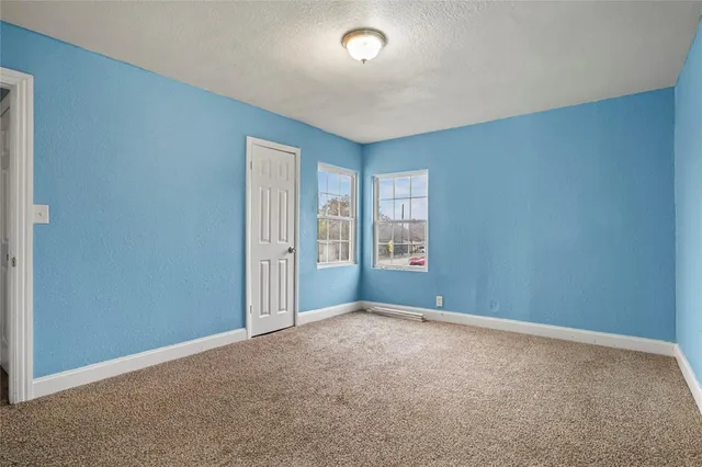 an empty room with windows