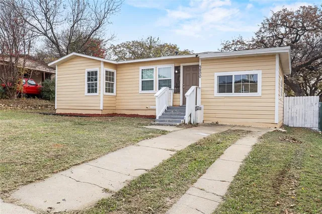 a front view of house with yard