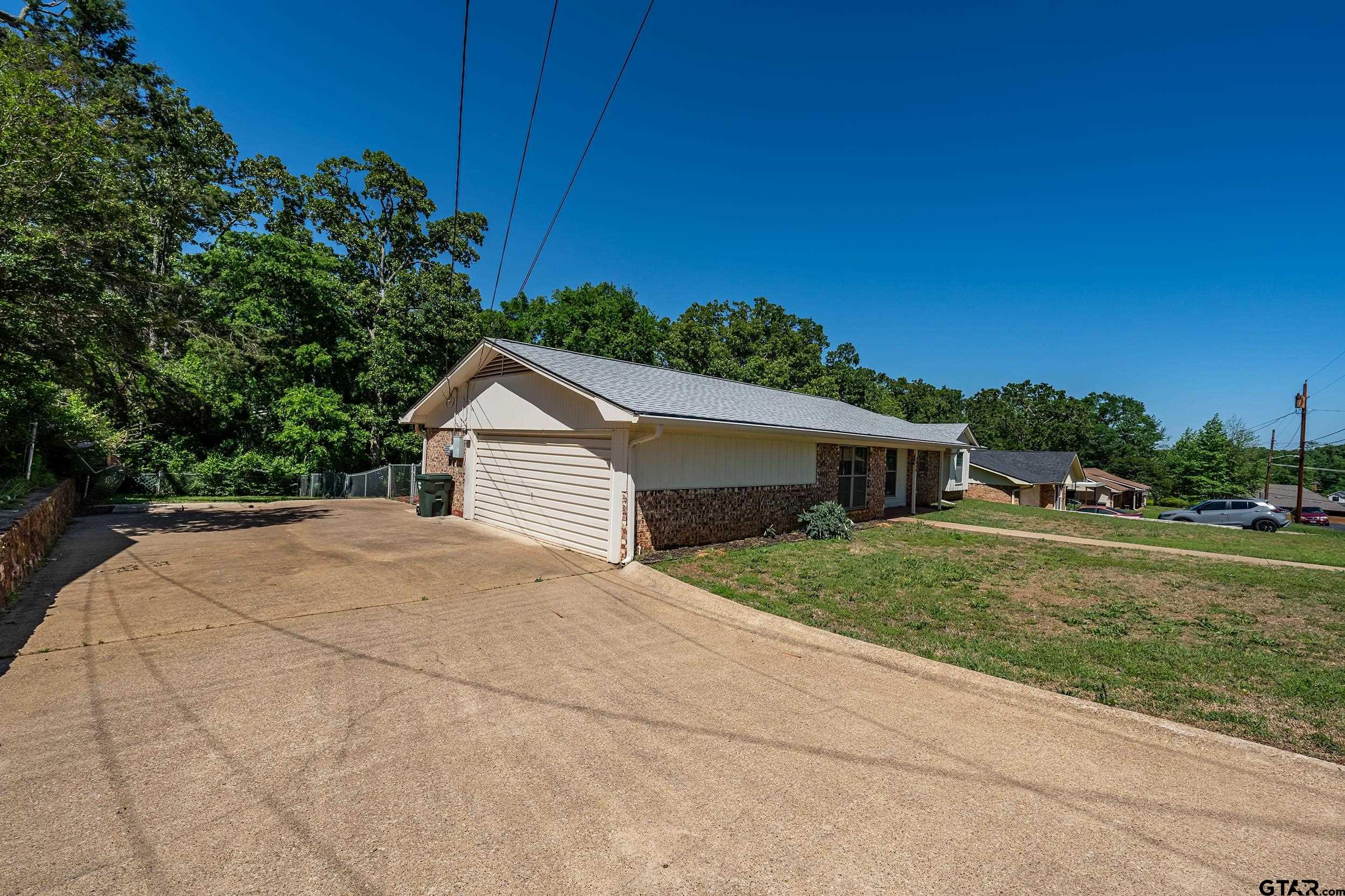 2026 Neeley Street Tyler, TX 75701 - Photo 4 of 26 a house view with a garden space