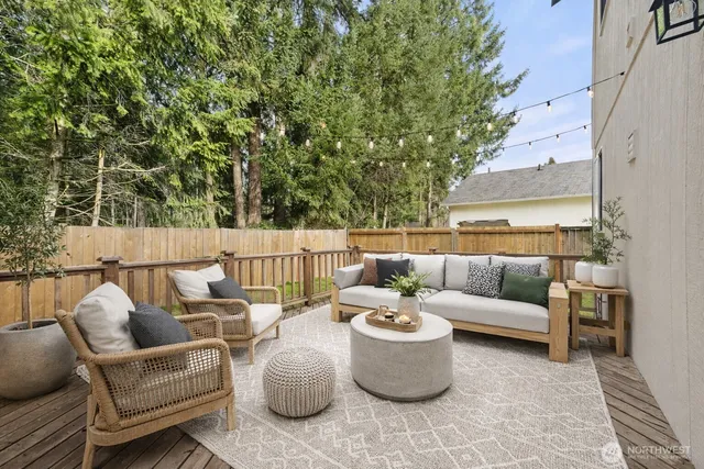 a view of backyard with swimming pool