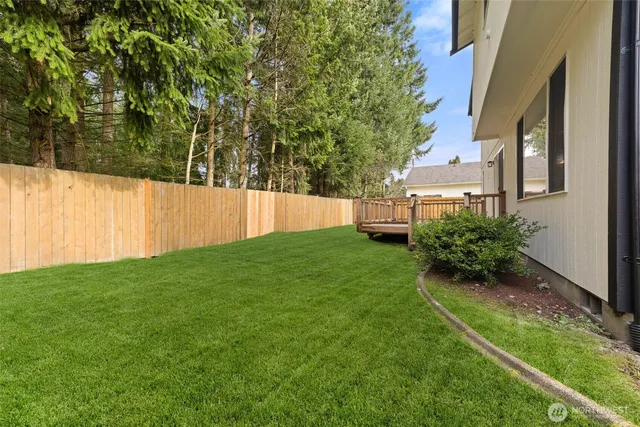 a view of a back yard of the house