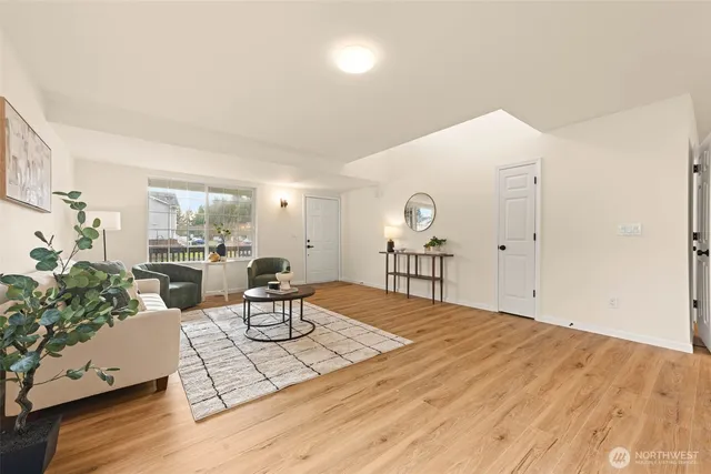 a kitchen with a table and chairs in it