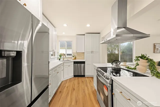 a view of a living room and dining room