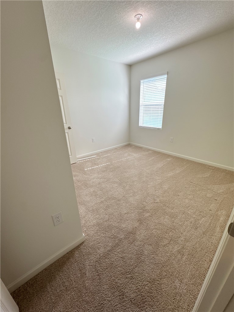1836 Barber Street Sebastian, FL 32958 - Photo 19 of 29 an empty room with a window