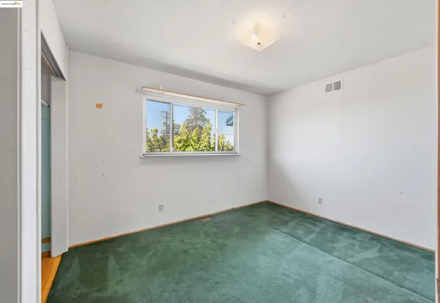 an empty room with a window