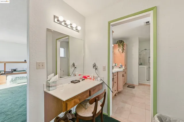 a view of a bathroom from a bedroom