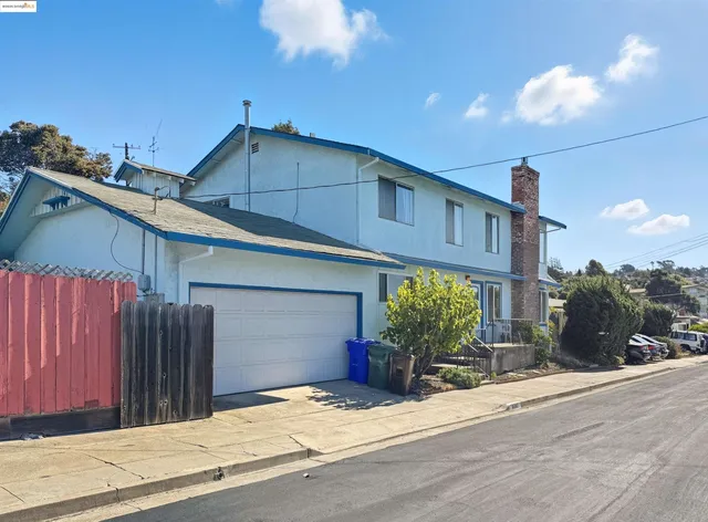 a house view with a outdoor space
