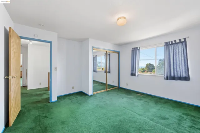 a view of an empty room with window