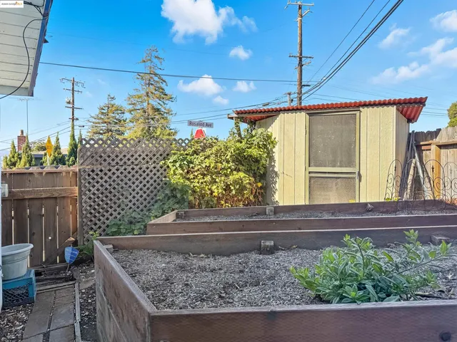a view of a balcony with wooden floor