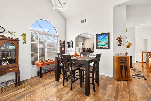 a view of a dining room with furniture window and outside view