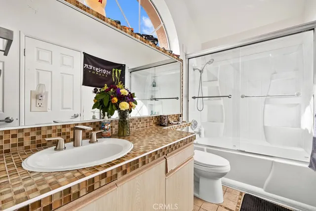 a view of a kitchen with washer and dryer