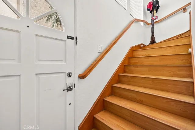 a view of a balcony with chairs