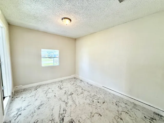 a view of a room with a window