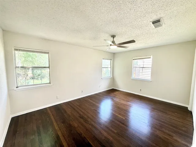 a kitchen with a sink cabinets and window