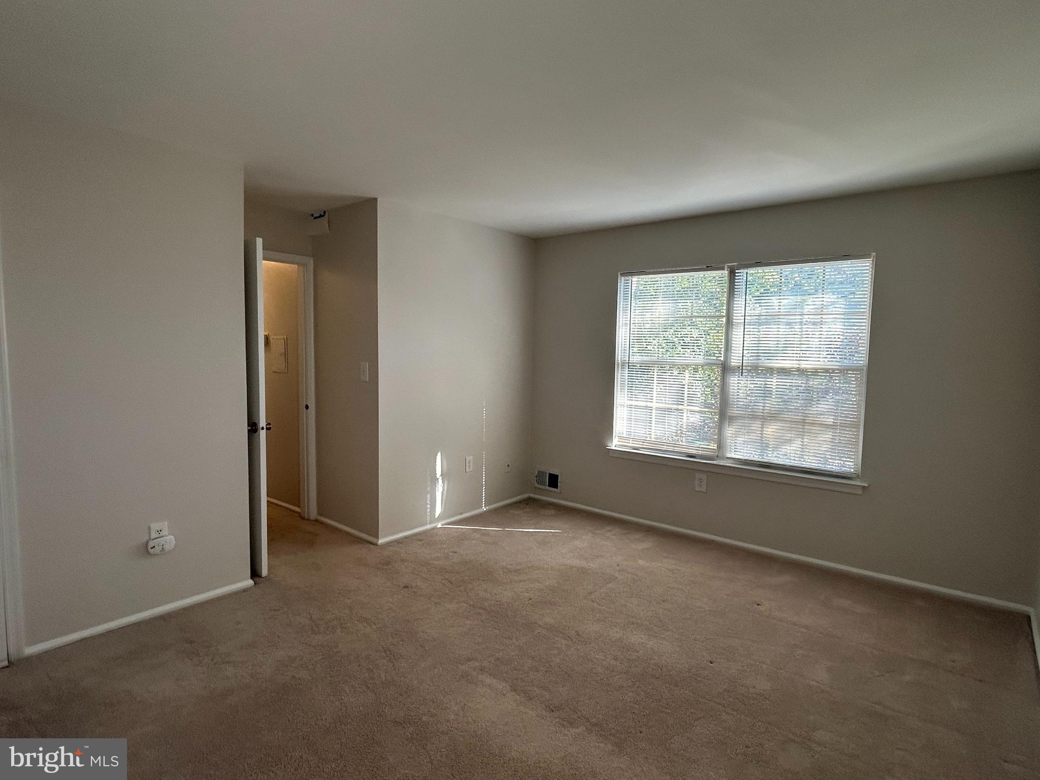 35 Coral Tree Court Lawrence Township, NJ 08648 - Photo 11 of 13 an empty room with windows