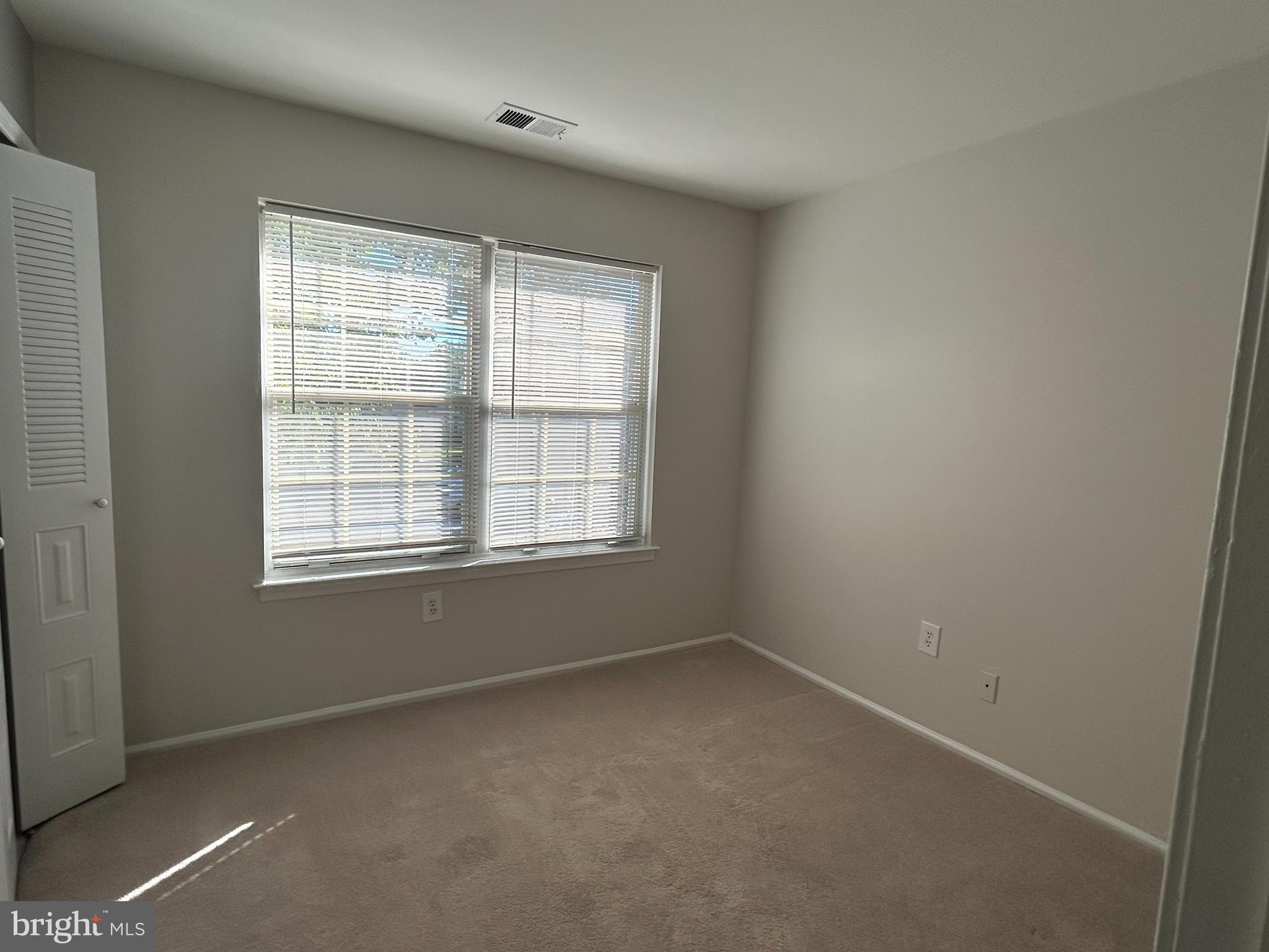 35 Coral Tree Court Lawrence Township, NJ 08648 - Photo 12 of 13 an empty room with a window