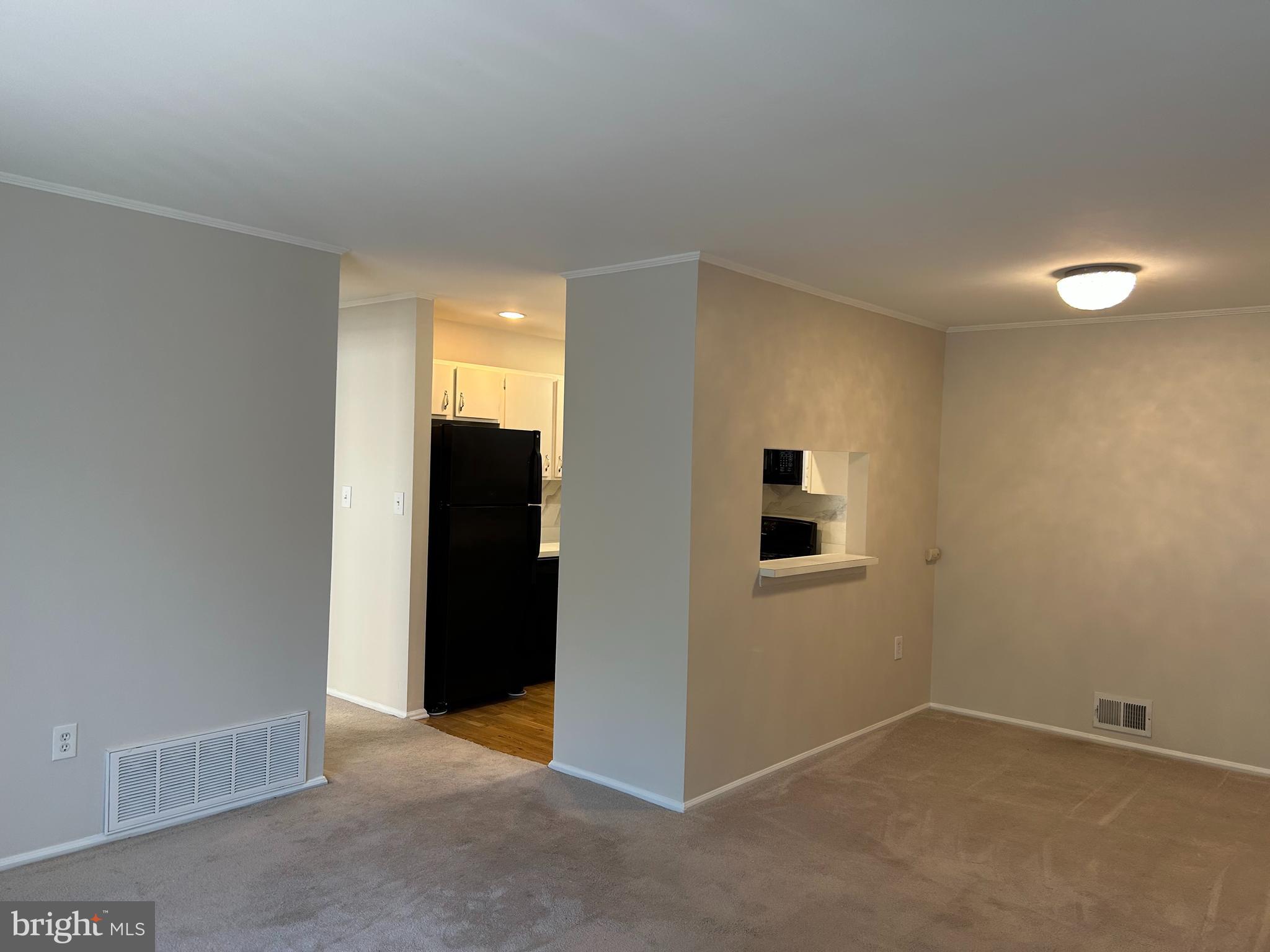 35 Coral Tree Court Lawrence Township, NJ 08648 - Photo 5 of 13 an empty room with closet and windows