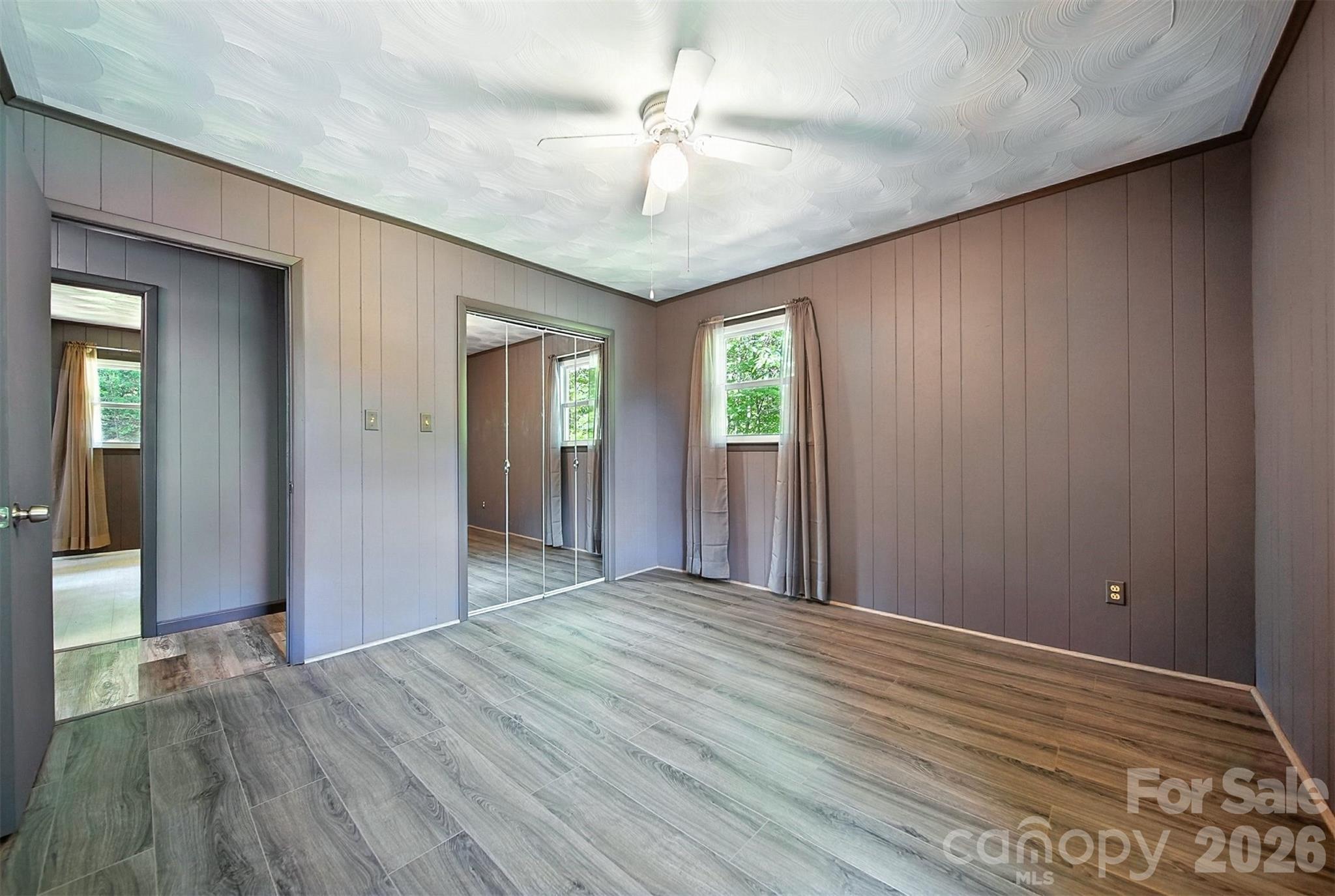 4967 Sugar Loaf Road Morganton, NC 28655 - Photo 27 of 37 wooden floor in an empty room with a window