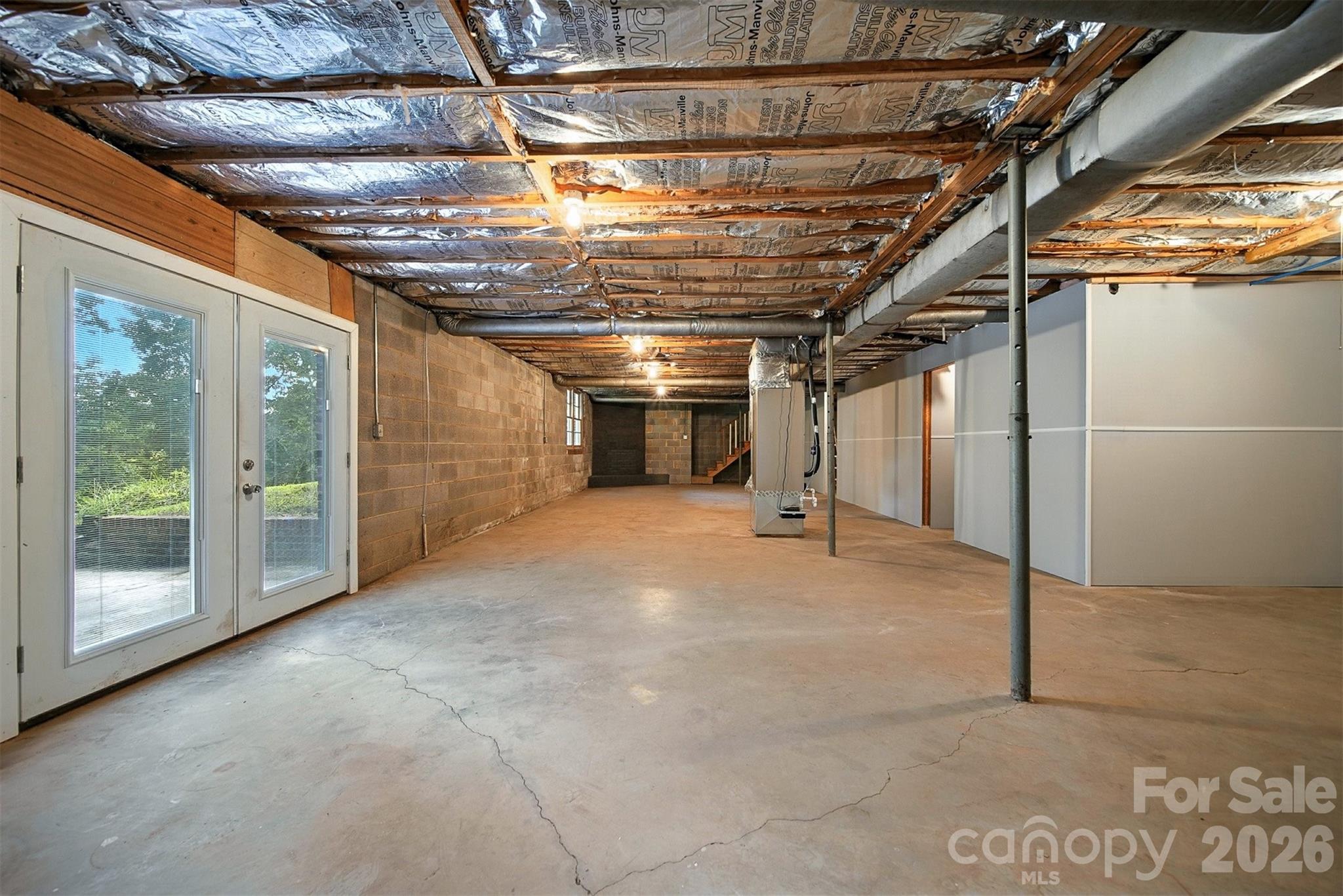 4967 Sugar Loaf Road Morganton, NC 28655 - Photo 29 of 37 a view of empty room with wooden walls