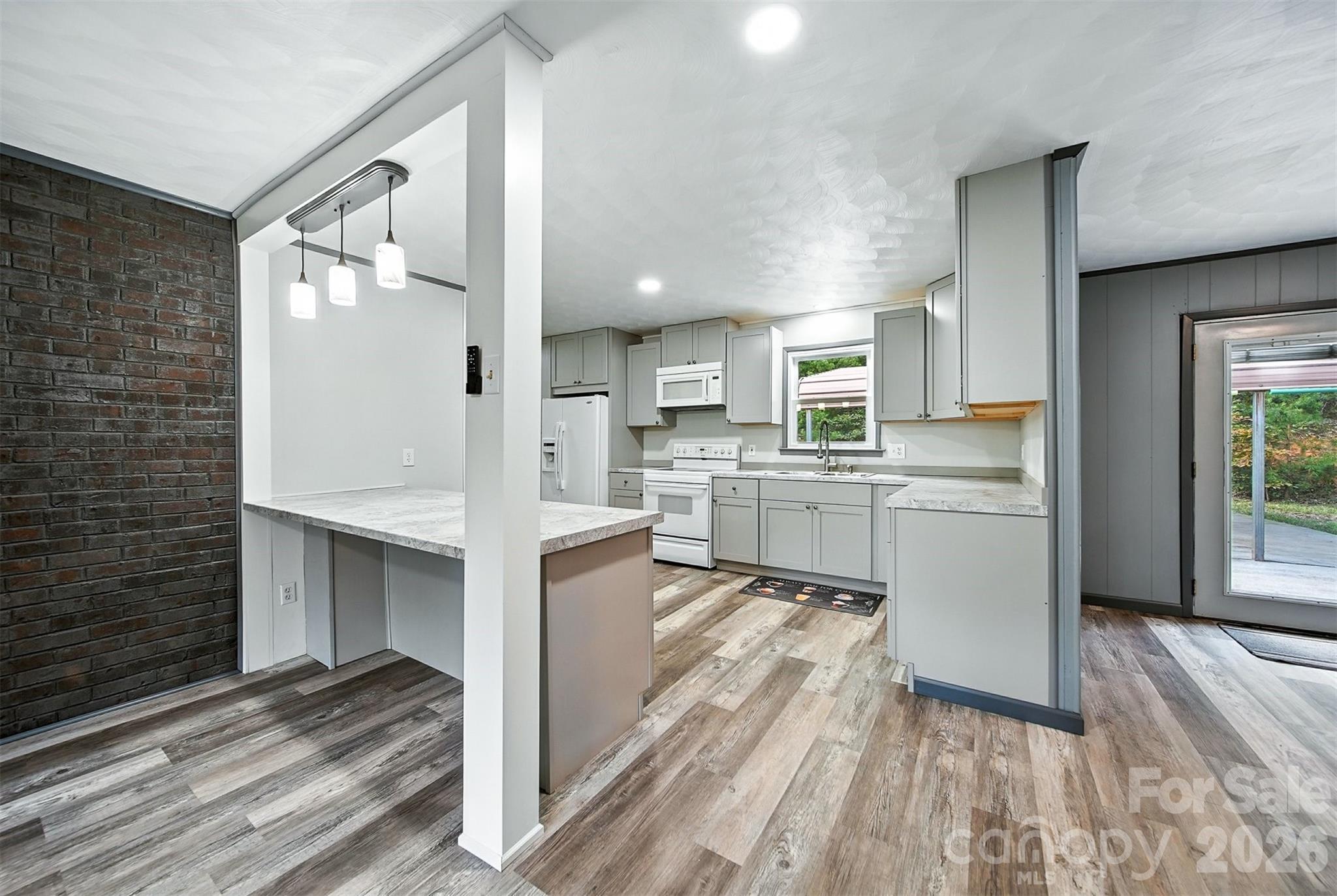 4967 Sugar Loaf Road Morganton, NC 28655 - Photo 4 of 37 a view of kitchen with sink and refrigerator