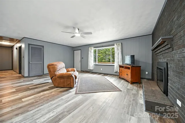 a spacious bedroom with a bed and a couch