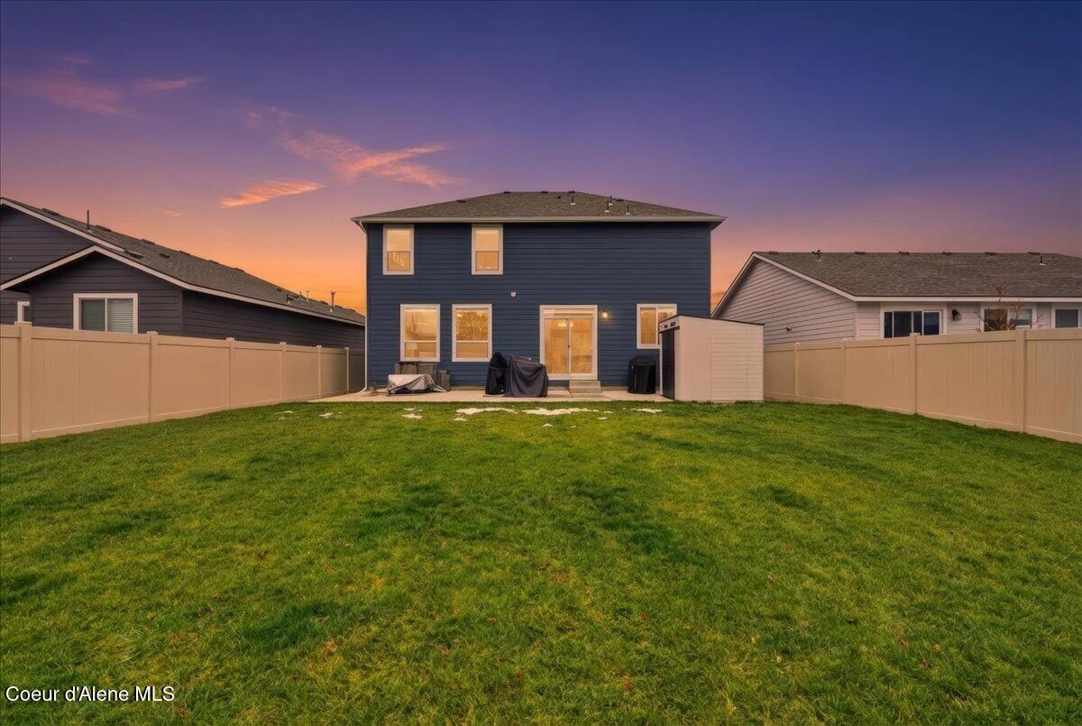 1074 East Allenby Court Post Falls, ID 83854 - Photo 2 of 43 02-Twilight Back of Home