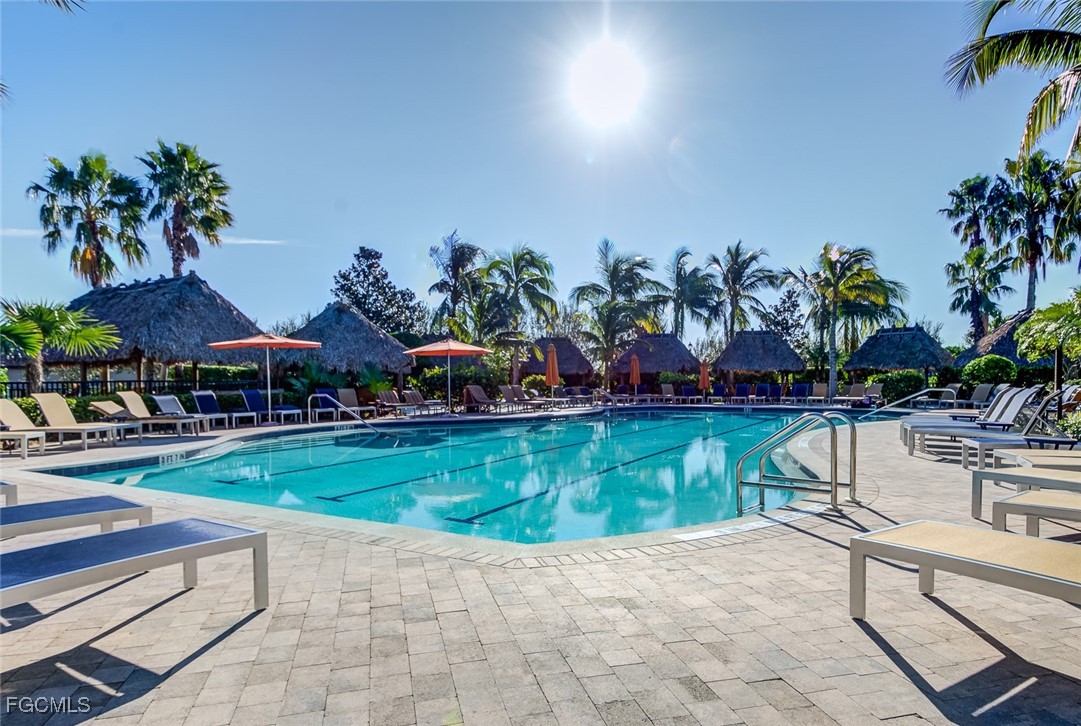 11856 Rocio Street, Unit 2003 Fort Myers, FL 33912 - Photo 30 of 43 a view of a swimming pool with a patio