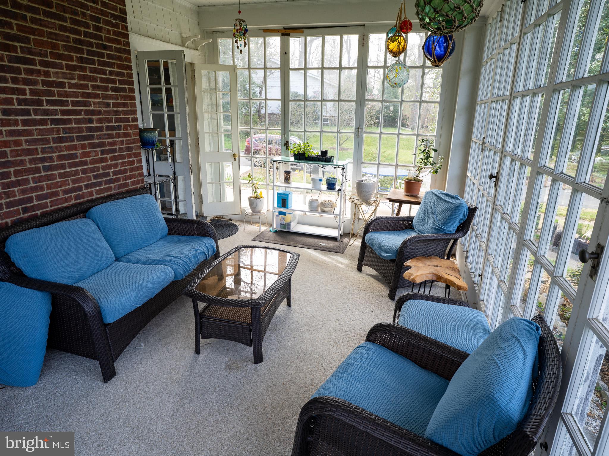 443 High Street Mount Holly, NJ 08060 - Photo 23 of 42 Serene sunlit porch retreat.