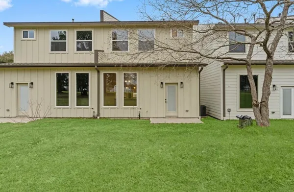 a house view with a garden space